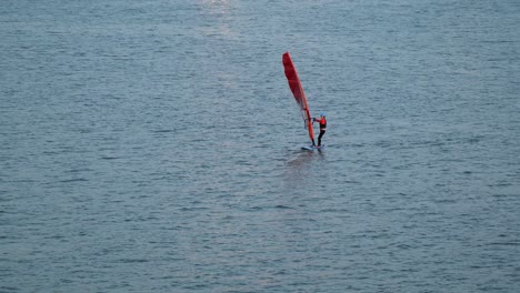 One-person-windsurfing-on-Han-river-at-Sunset-Seoul-Ttukseom-surfing-club