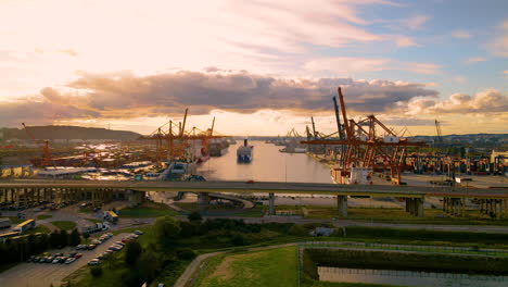 Cinematic-aerial-shot-of-Harbor-Shipyard-in-Gdynia-during-beautiful-sunrise,4K