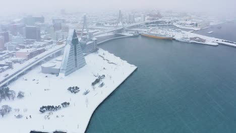 4k-Aerial-view-of-Aomori-City-and-Ferry-Port,-Northern-Japan-in-Winter
