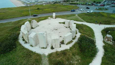 Aerial-View-Of-Memory-Stones,-Tout-Quarry,-Portland,-Dorset---drone-shot