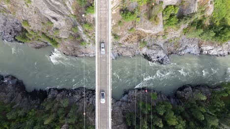 Vertical-top-down-view-of-Hagwilget-canyon-bridge-in-northern-British-Columbia-on-sunny-day