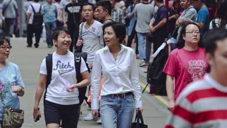 Slow-motion-of-generational-family-from-Hong-Kong-walking-the-crowded-street