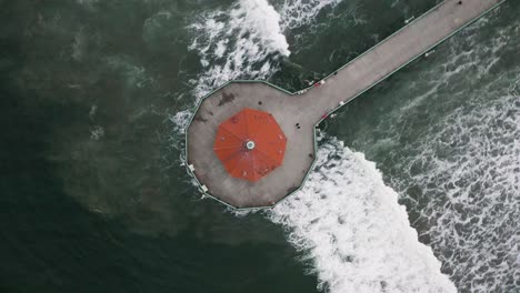 Drone-view-rotating-over-the-Manhattan-Beach-pier