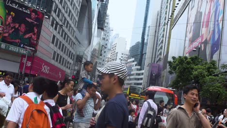 Crowds-Walking-In-Causeway-Bay-With-Public-Transport-In-Hong-Kong