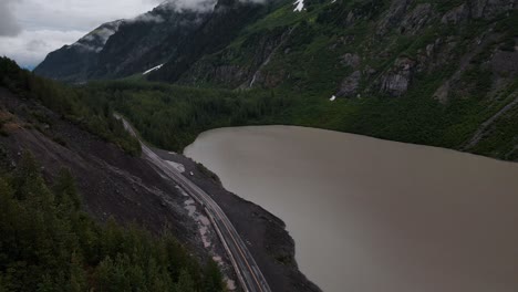 British-Columbia-Highway-cutting-through-mountains-and-valleys-next-to-Strohn-Lake-in-Bear-Glacier-Provincial-Park,-Canada