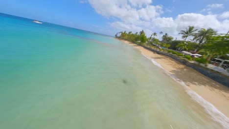 FPV-drone-flight-along-stunning-tropical-coastline-of-Playa-Punta-Popy