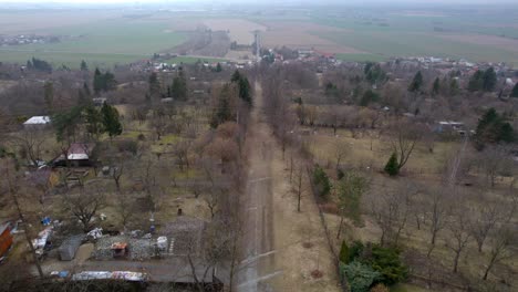 Křížová-cesta-leading-down-from-Svatý-kopeček-near-Olomouc-through-a-village-rural-landscape