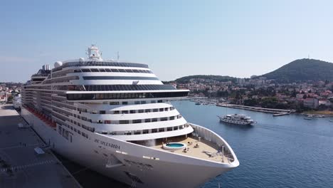 Cruise-Ship-at-the-Harbor-of-Dubrovnik,-Croatia---Aerial-Drone-View