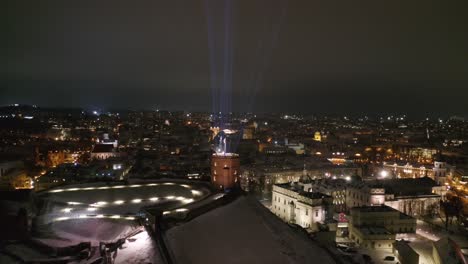 Laser-Beams-Shining-on-Top-of-Vilnius-Gediminas-Tower-in-Lithuania-at-Late-Evening-in-Winter