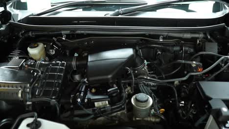 View-Of-Open-Bonnet-To-Reveal-Engine-Of-Black-Toyota-Land-Cruiser-Prado