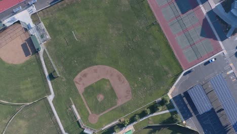 Drone-Descent-Empty-Baseball-Field-Birds-Eye-Point-of-View-Aerial