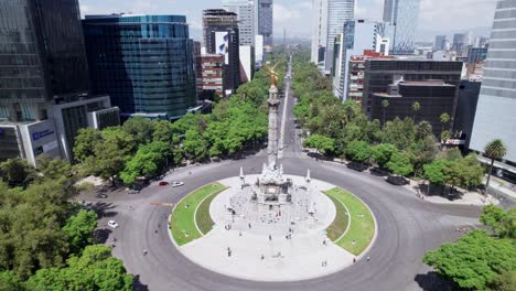 Aerial-View-Of-The-Angel-Of-Independence-On-Roundabout-Beside-Reforma-Avenue-On-Bright-Sunny-Day-In-Mexico-City