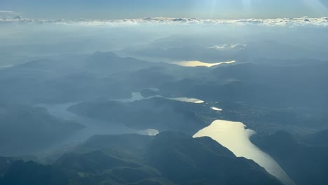 Misty-morning-view-of-panoramic-mountain-range-islands-from-above