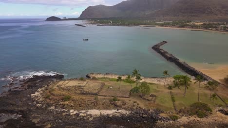 Aerial-view-of-Pokai-bay-in-Waianae-Oahu-on-a-calm-and-sunny-day