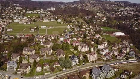 Drone-view-of-a-small-town,-Pully-next-to-Lausanne,-Vaud,-Switzerland