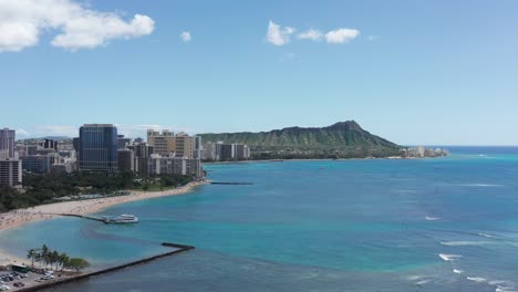 Super-wide-aerial-shot-of-Waikiki-with-the-Diamond-Head-monument-in-the-background-on-the-island-of-O'ahu,-Hawaii