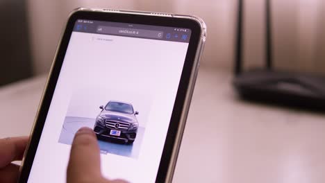 Browsing-an-online-marketplace-for-used-cars-on-the-Cars24-website