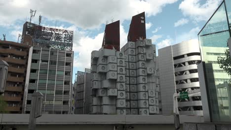 Demolition-works-continue-at-Tokyo's-iconic-Nakagin-Capsule-Tower-in-Ginza-on-April-16,-2022,-in-Tokyo,-Japan