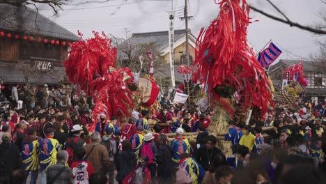 Wide-shot-of-crowd-attending-Japanese-Festival,-Year-of-Tiger-Sagicho-Matsuri