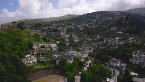 aerial-view-of-old-town-of-Gjirokaster,-a-UNESCO-World-Heritage-Site-in-Albania,-Europe