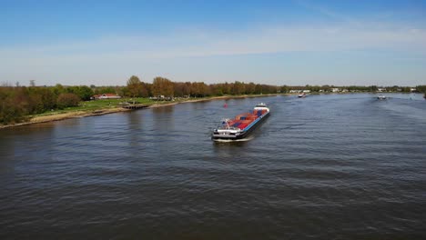 Cornelis-R-Container-Ship-Sailing-In-The-Oude-Maas-River-In-The-Netherlands