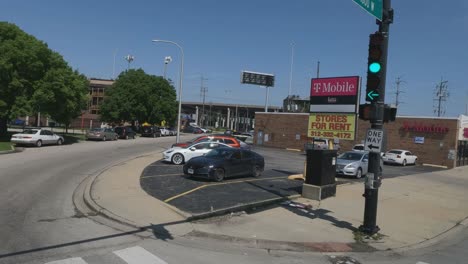 Turning-trucks-and-cars-at-traffic-light-in-Chicago-Illinois-on-Ashland-ave