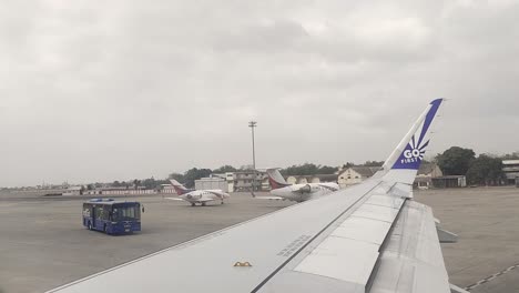 POV-window-shot-of-airplane-taking-off-from-the-airport