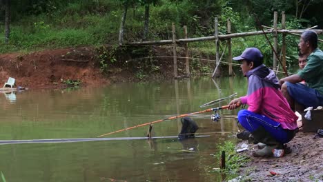 anglers-at-situ-cukang-Paku,-sukabumi,-West-Java,-May-3,-2022