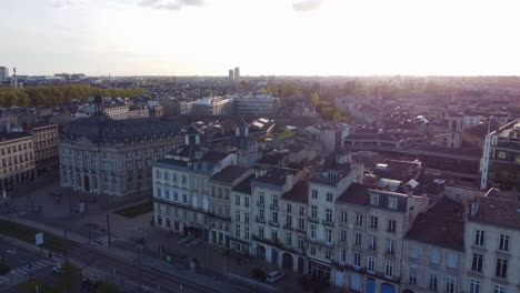 Historic-Building-Facades-in-Bordeaux,-Aerial-Rising-during-Sunset