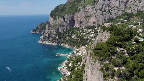 Dramatic-Cliffs-on-Beautiful-Coast-of-Capri-Island,-Italy---Aerial-Establishing-View