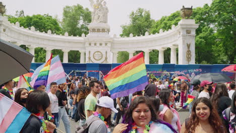Crowds-Carrying-Rainbow-Flags-Walking-Past-Hemiciclo-a-Juarez-For-Pride-Parade-On-25-June-2022