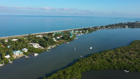 4k-drone-parallax-clip-over-the-Roosevelt-Channel-and-Buck-Key-Preserve-in-Captiva-Island,-Florida