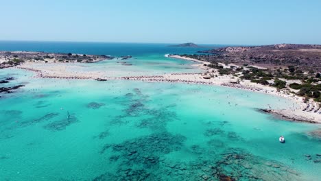 Aerial-view-of-water-sports,-activities-and-tourists,-Elafonissi-Beach