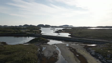 Scenic-Road-Connecting-Islands-In-Norway---Island-Landscape-In-Herøy---aerial-drone-shot