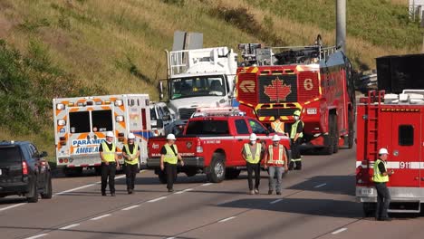 Rescue-Team-of-Firefighters-Arrive-at-the-Crash,-Catastrophe,-Fire-Site-on-their-Fire-Engine