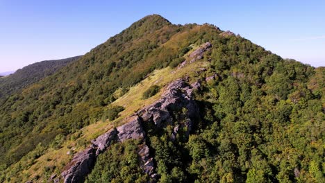 Aerial-push-into-rock-formation-near-the-top-of-Snake-Mountain-nc,-north-carolina-near-boone-nc