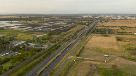 Low-aerial-perspective-tracking-traffic-along-major-arterial-highway
