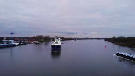 Aerial-Timelapse-Over-Oude-Mass-With-Vessels-Going-Past-In-Zwijndrecht