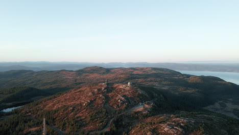 Bird's-Eye-View-Of-Abandoned-Grakallen-Radarhode-On-The-Summit-Of-Mountain-At-Sunrise-In-Norway