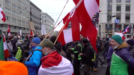 Nationalist-far-right-anti-vaxers-marching-through-streets-during-protests