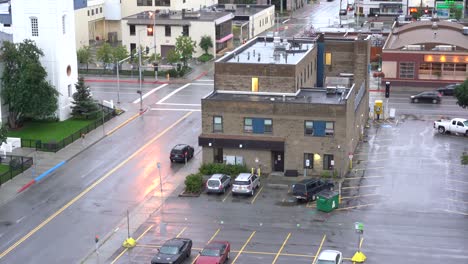 rainy-day-overlooking-dimly-lit-parking-lot