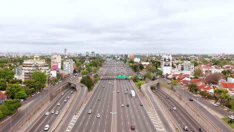 Drone-flying-forwards-to-the-rhythm-of-the-multiple-cars-driving-along-the-giant-and-famous-Pan-American-Highway-in-Argentina