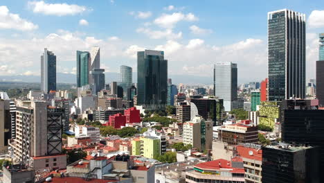 Aerial-panoramic-view-of-Mexico-City-skyline-with-blue-sky-towards-Paseo-de-la-Reforma-from-Colonia-Juarez