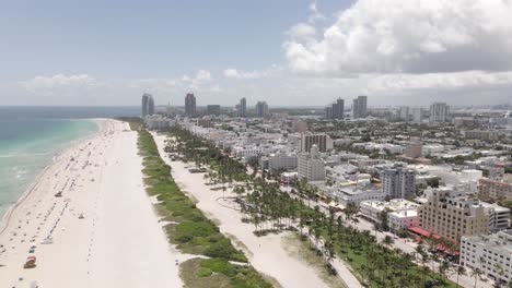 Aerial-flight-over-South-Beach-Miami-approaches-Ocean-Drive-buildings