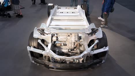 Tesla-Motor-chassis-car-and-vehicle-frame-of-a-motor-vehicle-are-seen-displayed-during-the-International-Motor-Expo-showcasing-EV-electric-cars-in-Hong-Kong
