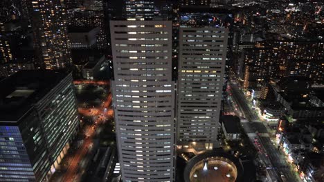 Asia-Business-concept-for-real-estate-and-corporate-construction,-modern-city-skyline-aerial-night-view-of-Tokyo-under-blue-sky-in-Japan