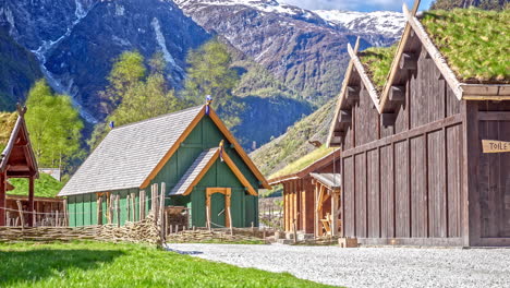 Sunshine-on-traditional-viking-houses-in-tourist-attraction-viking-valley,-Norway