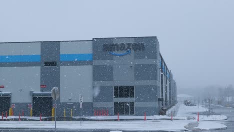 Amazon-warehouse-with-heavy-snow-falling