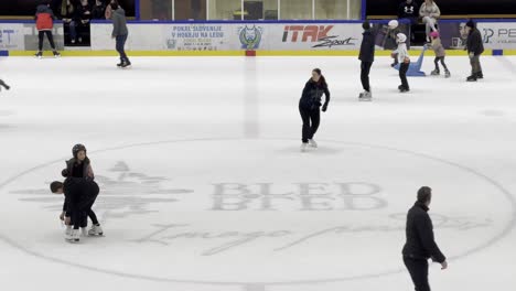 People-Ice-Skating-on-indoor-Ice-Rink