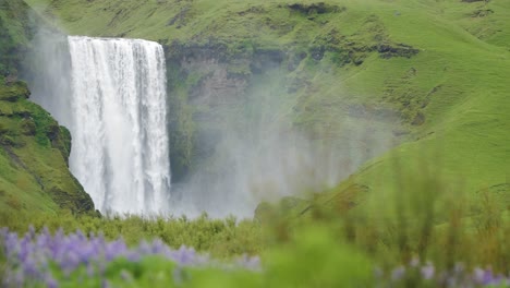 Iceland-waterfall-in-verdant-landscape